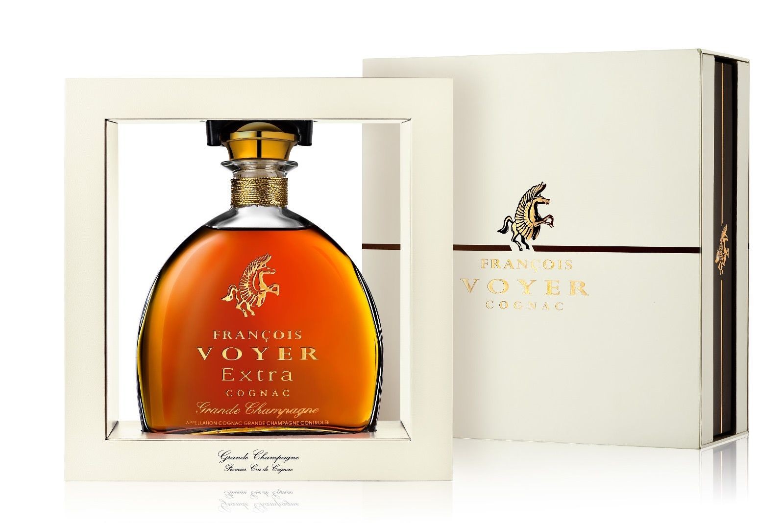 François Voyer Extra Cognac bottle in a luxurious box with gold lettering and design.