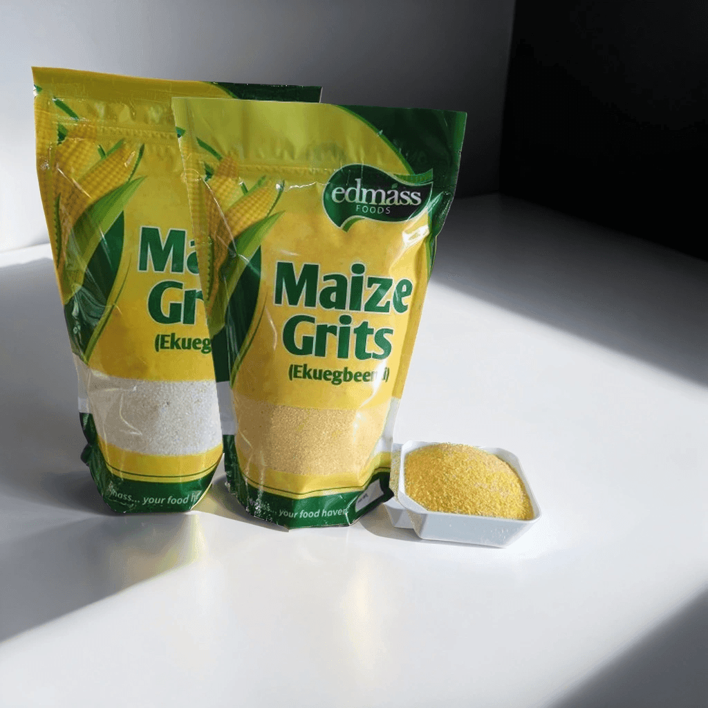 Two packages of maize grits with a portion in a small plastic dish on a white surface.